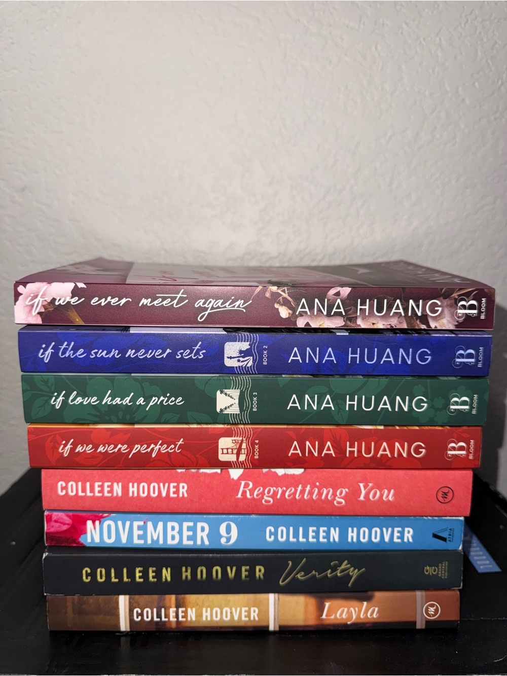 Stacked Hardcover Books by Ana Huang and Colleen Hoover